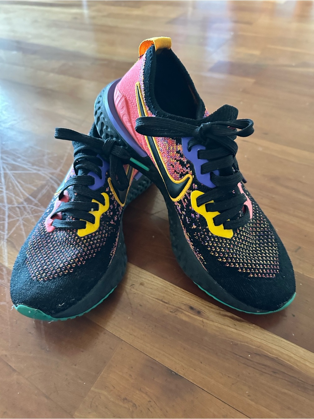 Nike Women's Black Knit Sneakers with Yellow & Purple Accents